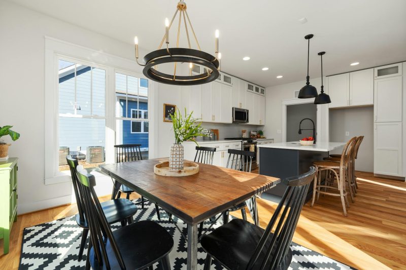 Bright and modern kitchen and dining space with stylish furnishings and natural light.